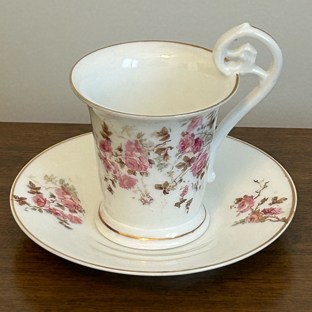 GERMANY TEA CUP TEACUP AND SAUCER WITH ROSES PATTERN AND TRIMMED IN GOLD
